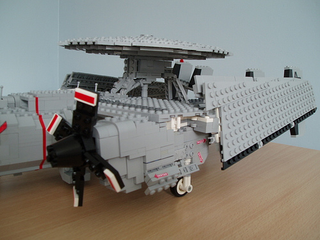 Illustration for article titled Giant LEGO B-1B Bomber Escorted by Fighters, Hawkeye Aircraft